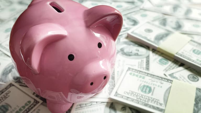 gettyimages piggy bank on a pile of money.jpg