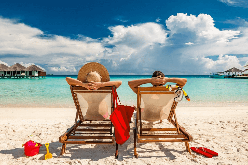 man and woman in beach chairs.width tZcHGNG.png